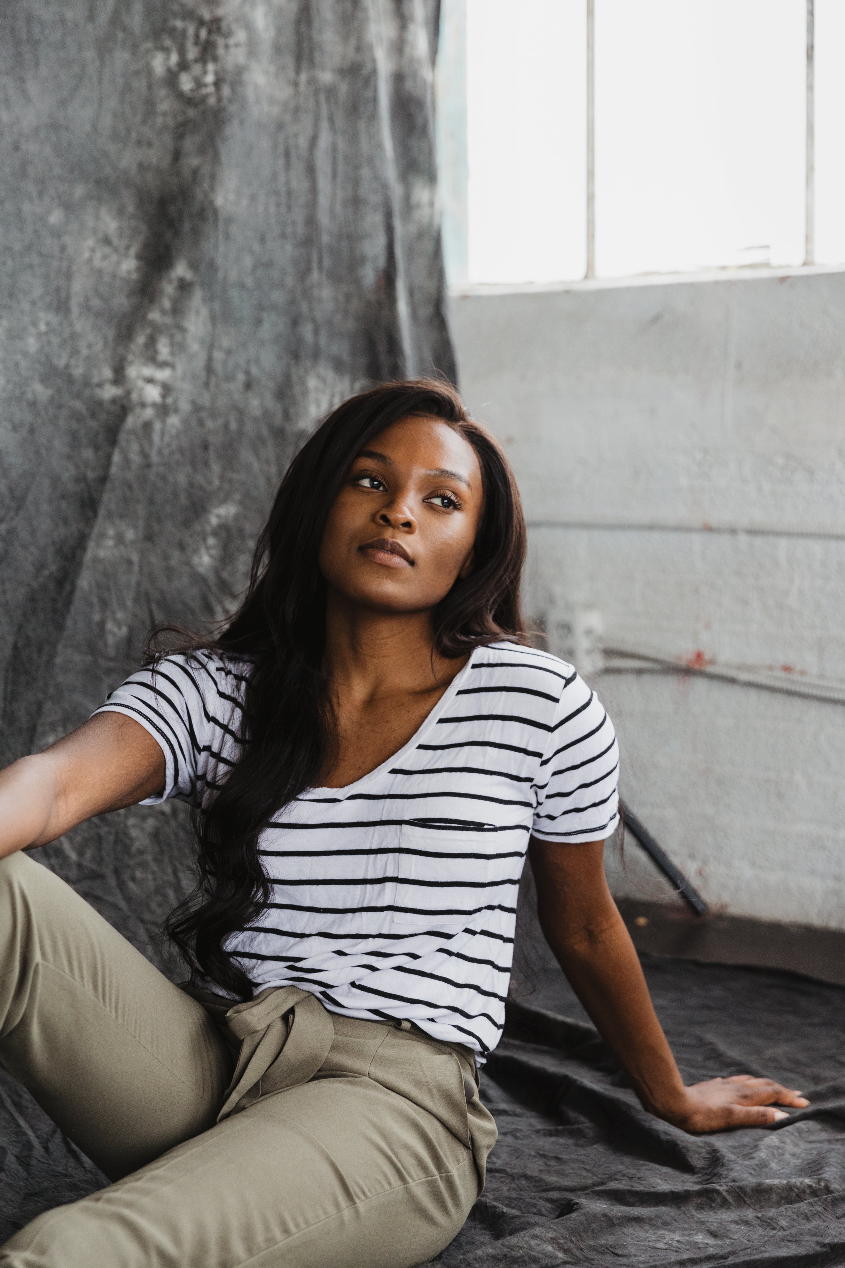 files/a-model-in-khaki-trousers-and-a-striped-t-shirt.jpg